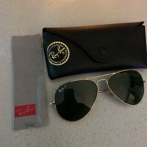 Ray-ban aviator gold polarized glasses.